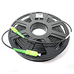 Stock 100 Ft Tactical Indoor/Outdoor Armored Singlemode 9/125 Simplex Fiber Optic Patch Cable w/ SC APC Connectors, Corning® Glass, Mini Cable Reel, and Ultra Flexible Jacket - Made in the USA by QuickTreX®